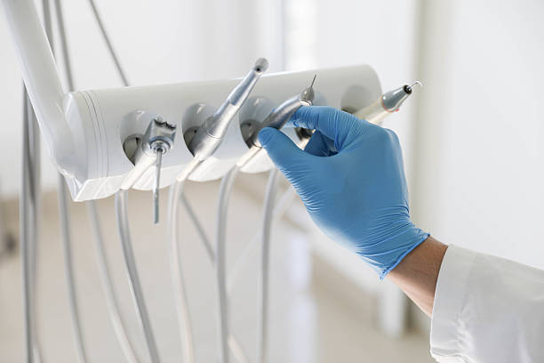 Professional Tooth Extraction technician working in Cutler, CA